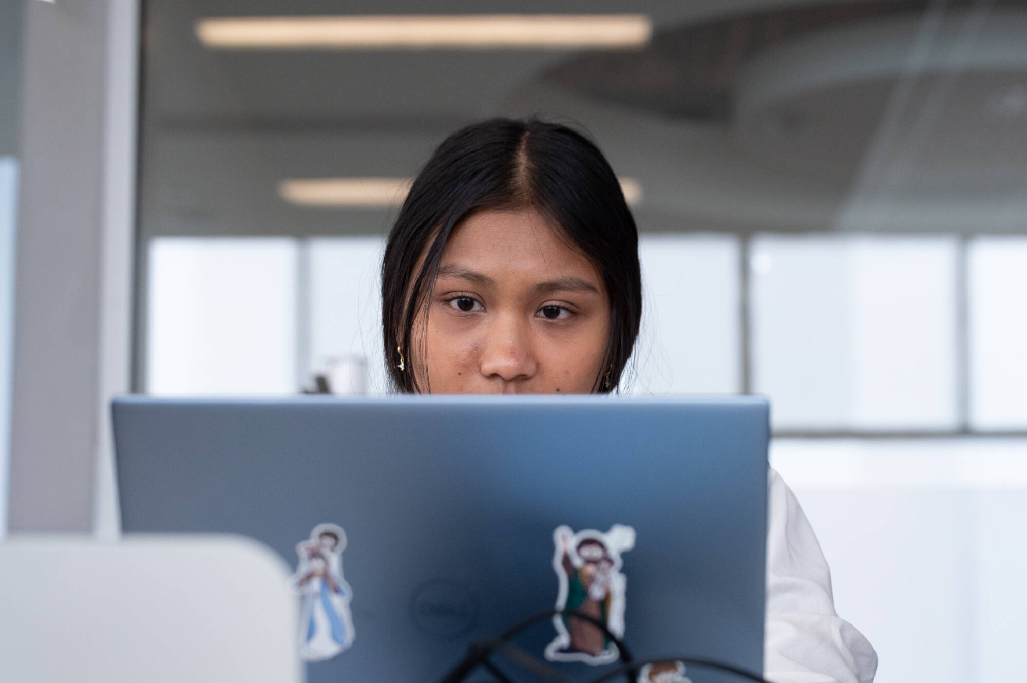 An individual at a computer